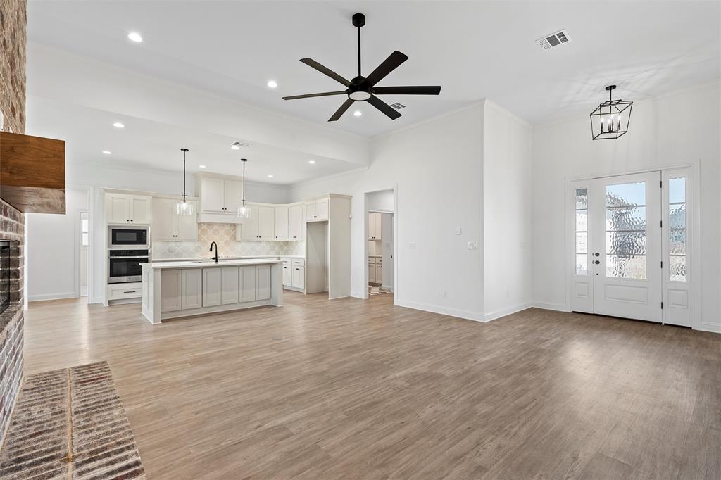 2113 Holborn Street Lorena, TX 76655 - Photo 24 of 31 a view of kitchen with stainless steel appliances refrigerator oven and cabinets