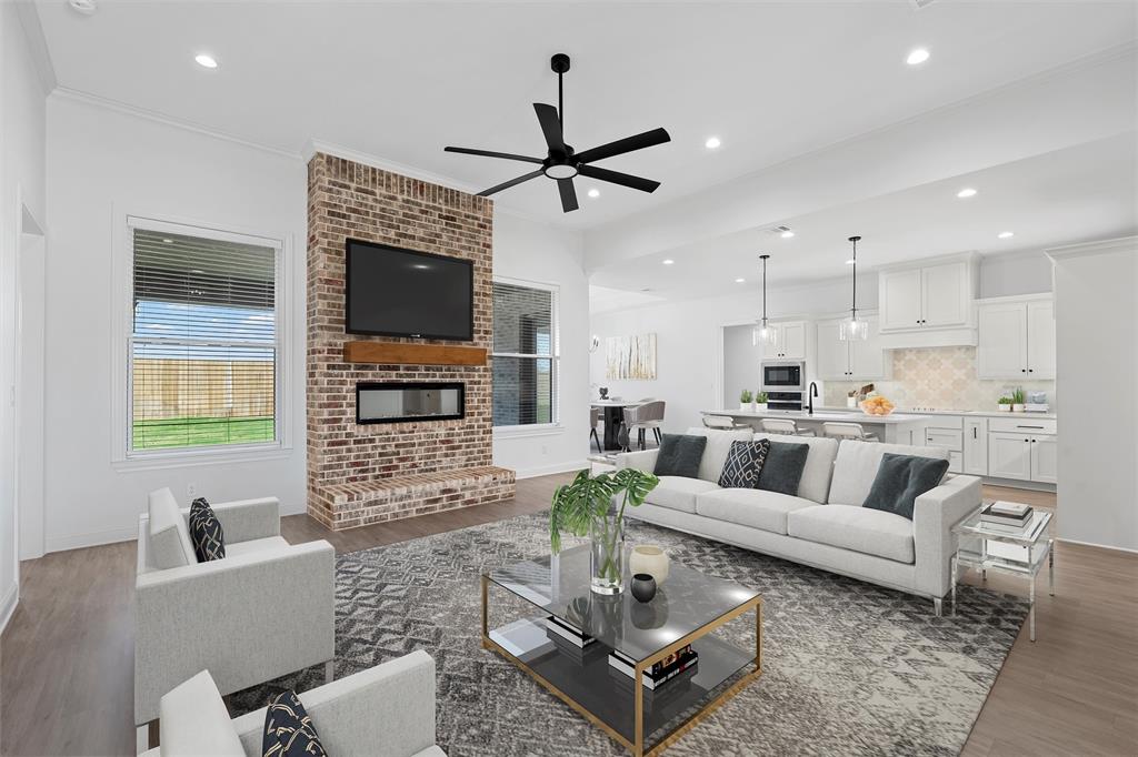 2113 Holborn Street Lorena, TX 76655 - Photo 4 of 31 a living room with furniture and a fireplace