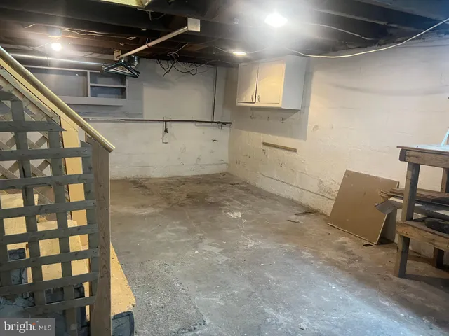 a room with furniture and a flat screen tv