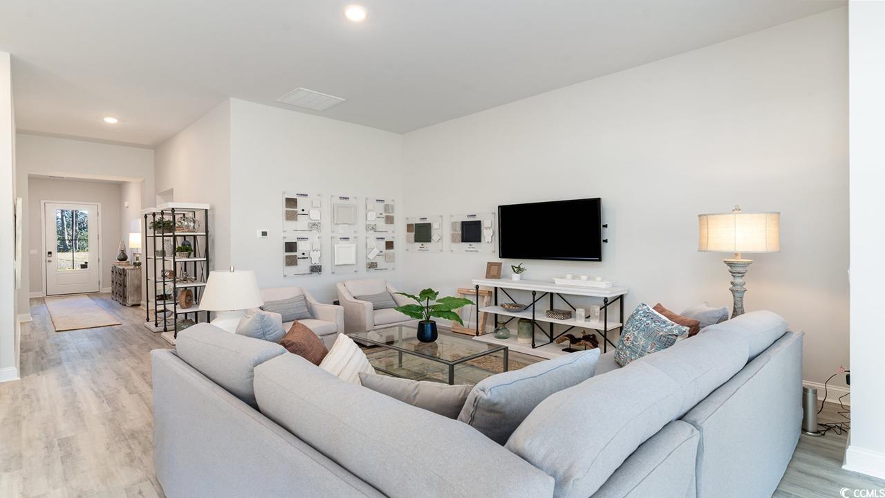 803 Ireland Drive Longs, SC 29568 - Photo 14 of 26 Living room with light hardwood / wood-style floor
