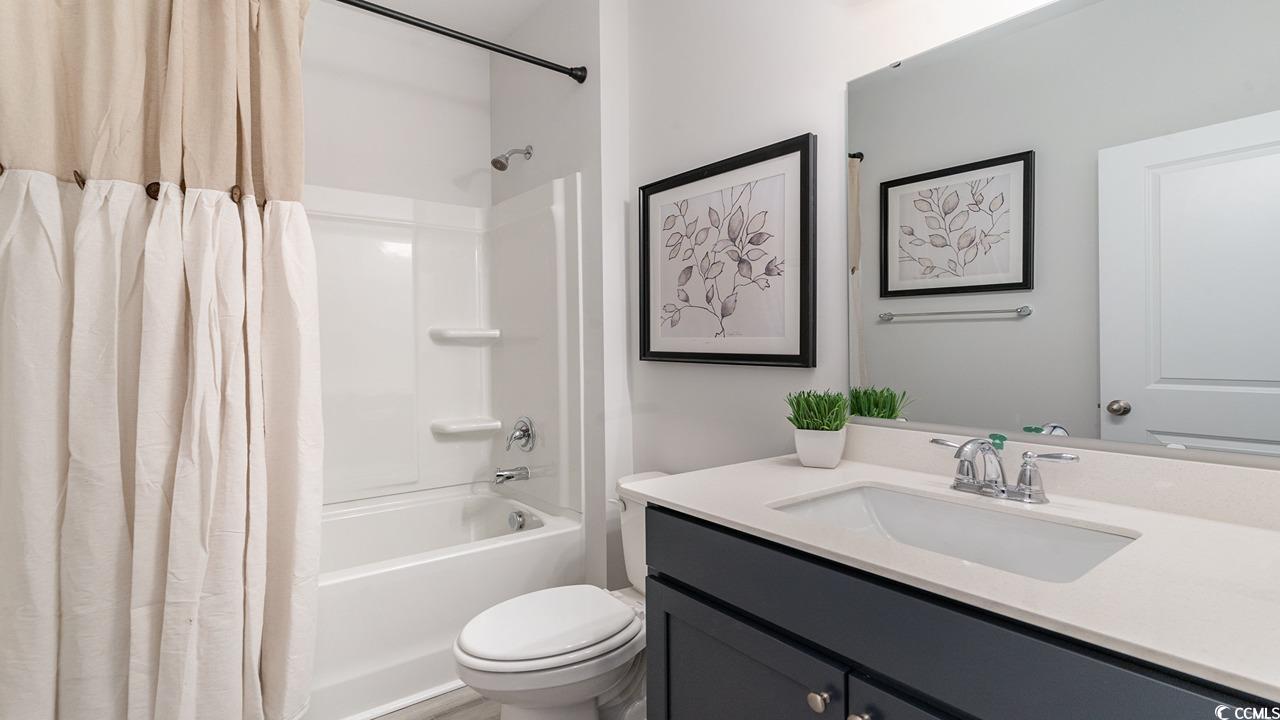 803 Ireland Drive Longs, SC 29568 - Photo 5 of 26 Full bathroom featuring shower / tub combo, vanity