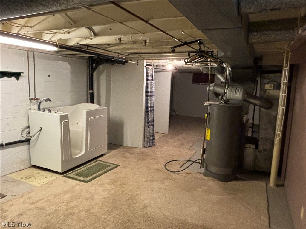 2421 Burbank Road Wooster, OH 44691 - Photo 17 of 23 Basement with water heater and washer / dryer