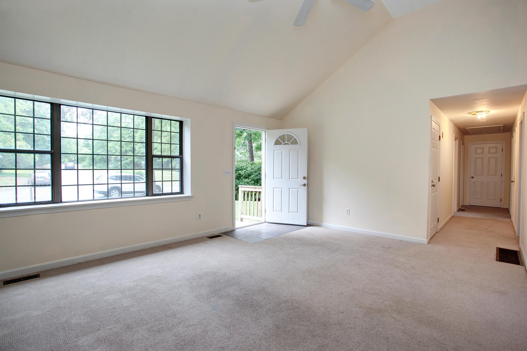 211 Oldham Road Osterville, MA 02655 - Photo 2 of 26 an empty room with windows