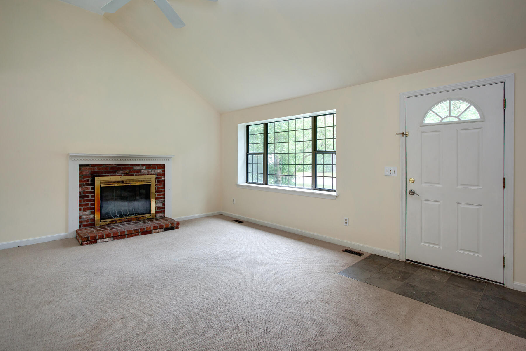 211 Oldham Road Osterville, MA 02655 - Photo 3 of 26 an empty room with windows and fireplace