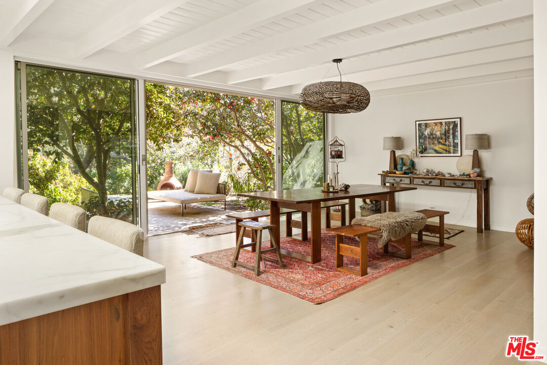 830 Brooktree Road Pacific Palisades, CA 90272 - Photo 14 of 37 a living room with furniture and a large window