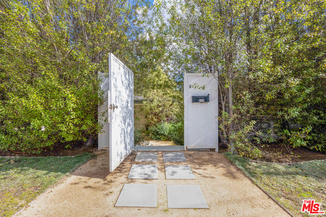 830 Brooktree Road Pacific Palisades, CA 90272 - Photo 2 of 37 a view of a pathway both side of house