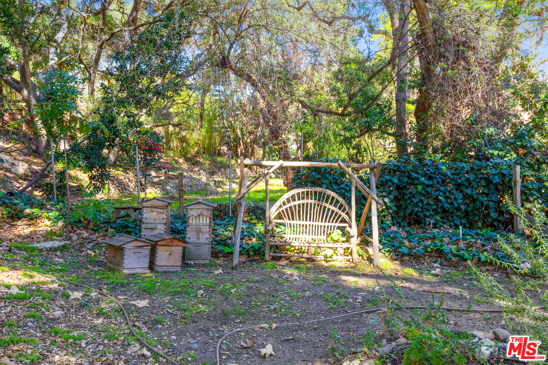 830 Brooktree Road Pacific Palisades, CA 90272 - Photo 37 of 37 a view of a house with a yard
