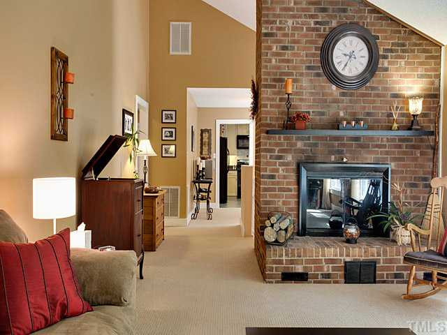 3623 Swann Street Raleigh, NC 27612 - Photo 4 of 22 One of two family rooms each with wood burning fireplaces.