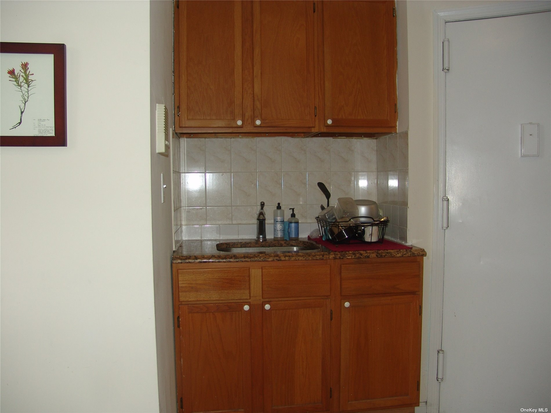 1724 8th Avenue, Unit 6 Brooklyn, NY 11215 - Photo 17 of 36 a room with sink and cabinets