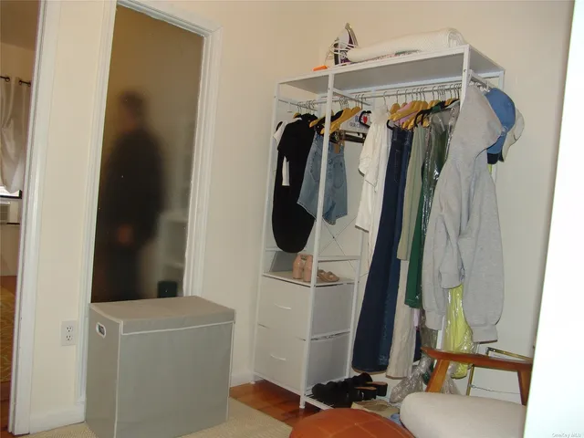 a bathroom with a sink a mirror and window