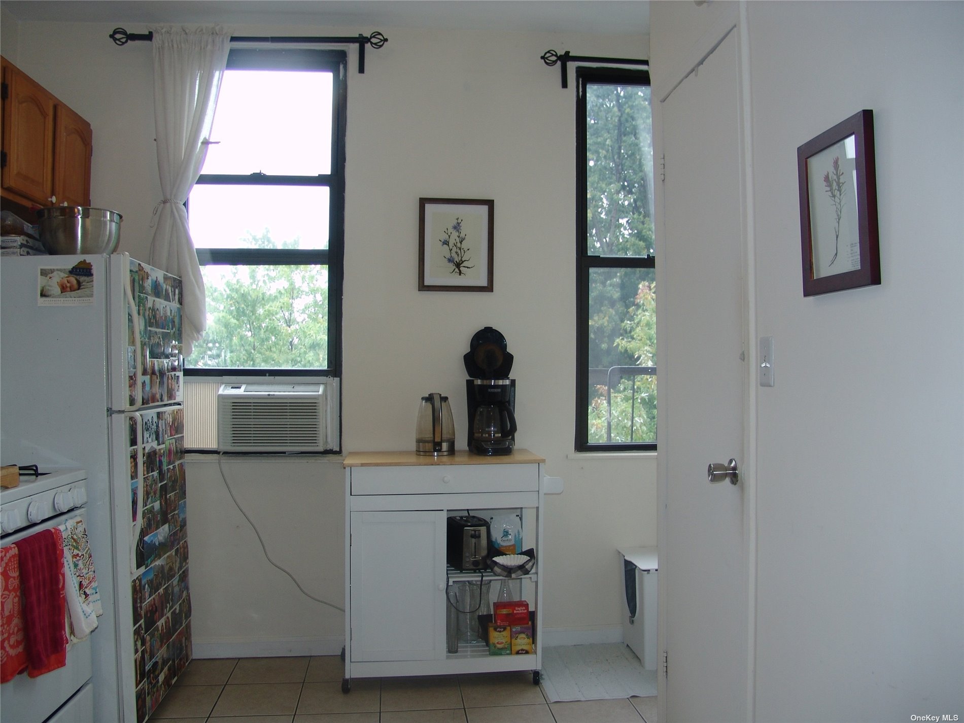 1724 8th Avenue, Unit 6 Brooklyn, NY 11215 - Photo 23 of 36 a bathroom with a sink a mirror and window