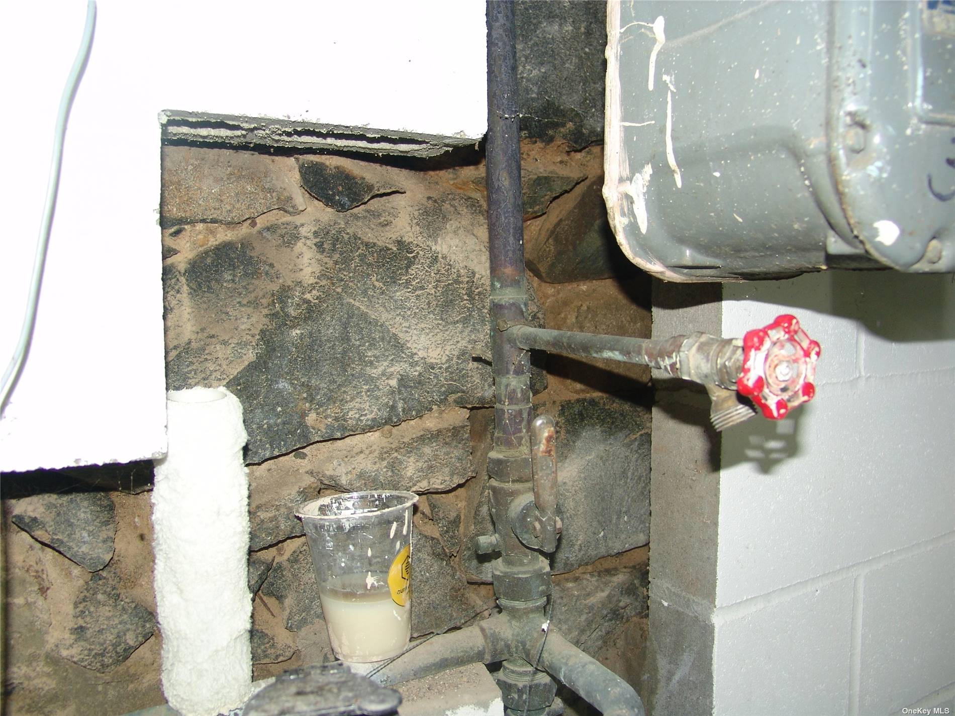 1724 8th Avenue, Unit 6 Brooklyn, NY 11215 - Photo 31 of 36 a bathroom with a granite countertop shower a mirror and a sink