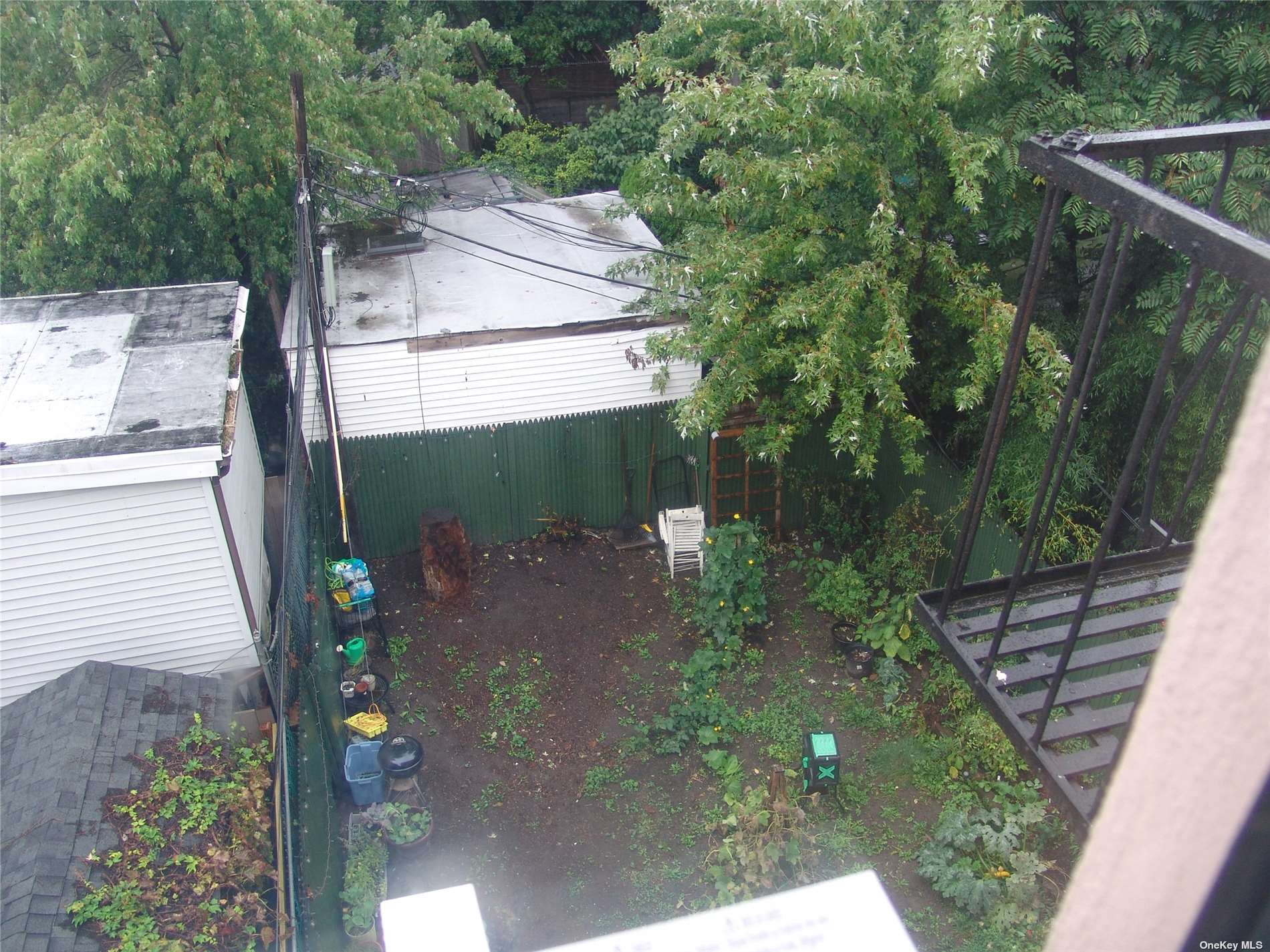 1724 8th Avenue, Unit 6 Brooklyn, NY 11215 - Photo 6 of 36 a backyard of a house with lots of green space