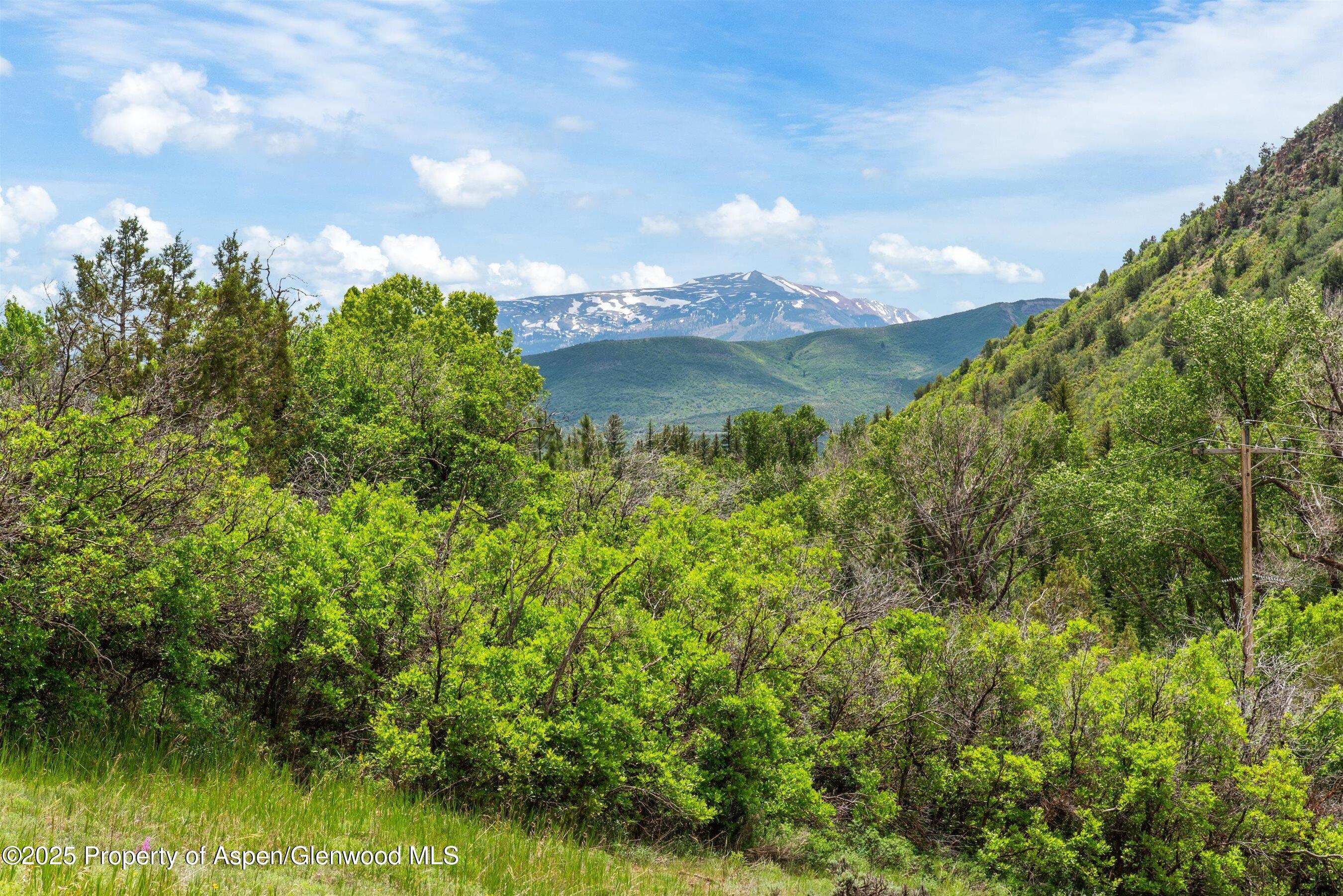 354 Snowmass Creek Road Snowmass, CO 81654 - Photo 6 of 53 a view of a lake