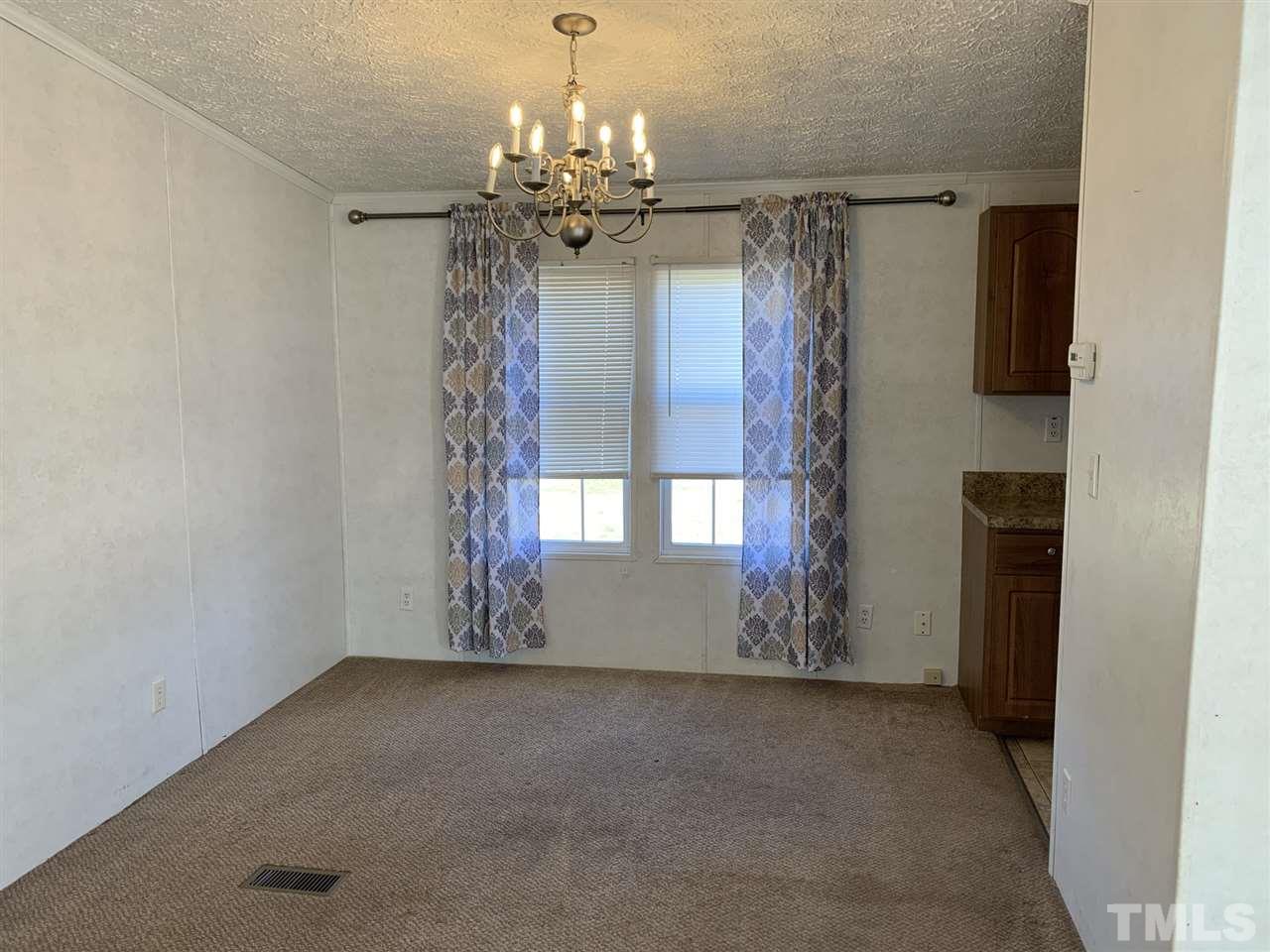 43 Williams Road Spring Hope, NC 27882 - Photo 14 of 30 a view of a windows and chandelier in big room