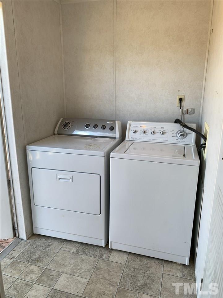 43 Williams Road Spring Hope, NC 27882 - Photo 22 of 30 a utility room with dryer and washer