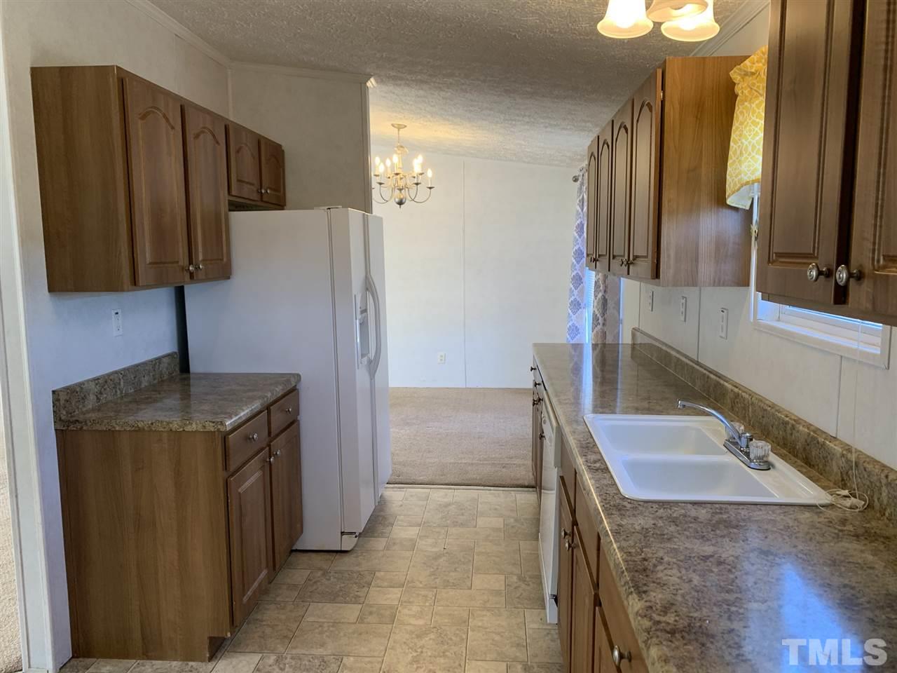 43 Williams Road Spring Hope, NC 27882 - Photo 6 of 30 a bathroom with a sink and a mirror