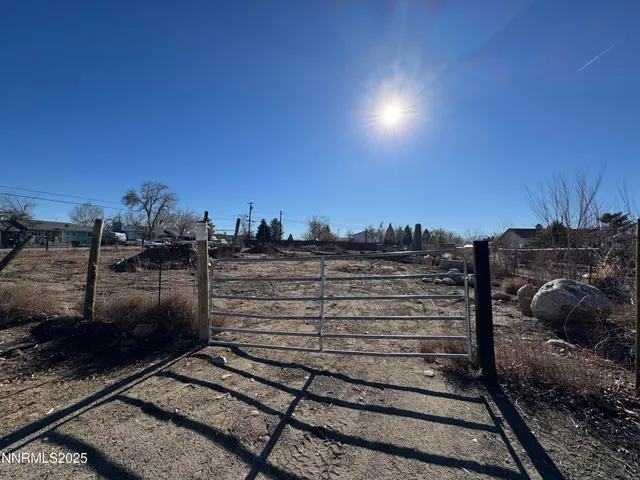 a view of a back yard of the house
