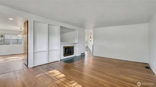 a view of a livingroom with wooden floor