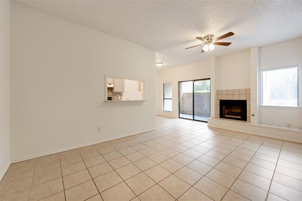 9100 Mountain Ridge Drive, Unit 105 Austin, TX 78759 - Photo 3 of 17 a view of an empty room with a window