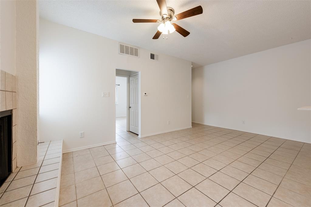 9100 Mountain Ridge Drive, Unit 105 Austin, TX 78759 - Photo 4 of 17 a view of an empty room