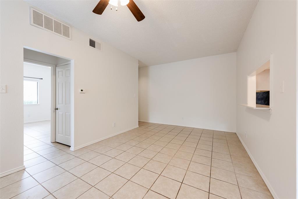 9100 Mountain Ridge Drive, Unit 105 Austin, TX 78759 - Photo 5 of 17 a view of an empty room