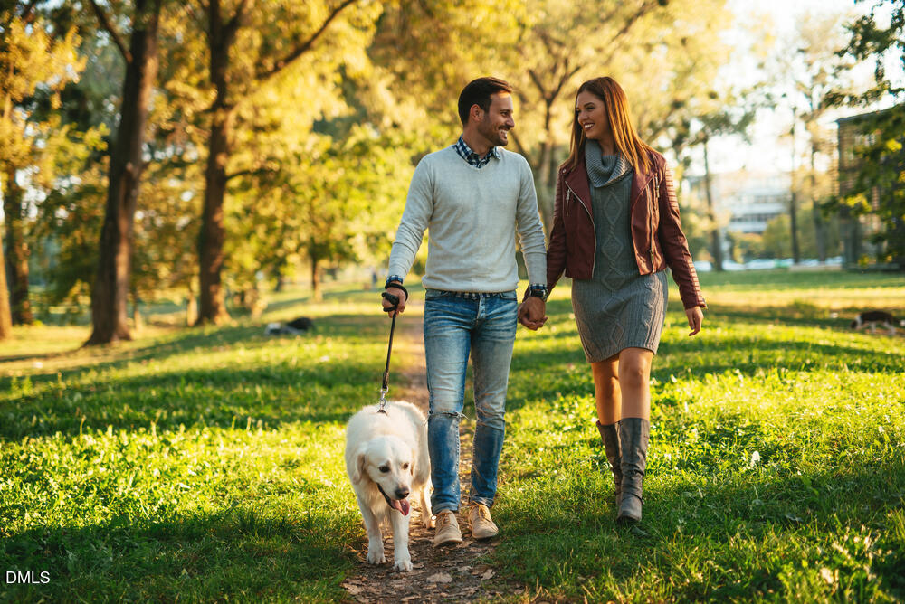 3208 Goldney Road Raleigh, NC 27610 - Photo 26 of 33 Couple Walking with Dog_Lifestyle_Couple