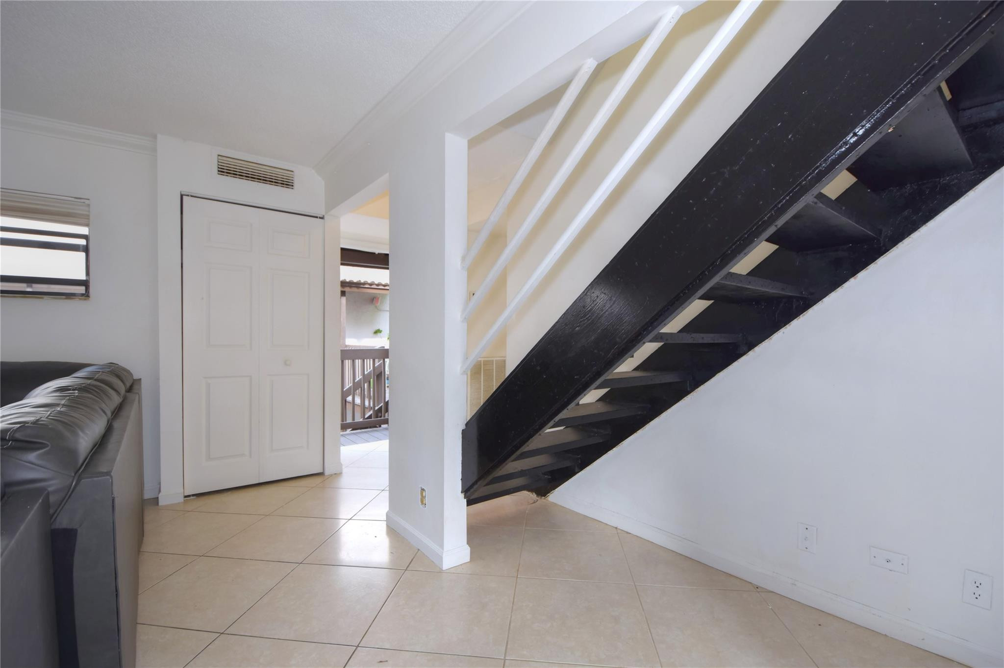 149 Northwest 70th Street, Unit 305C Boca Raton, FL 33487 - Photo 13 of 32 Stairs to bedrooms on second floor