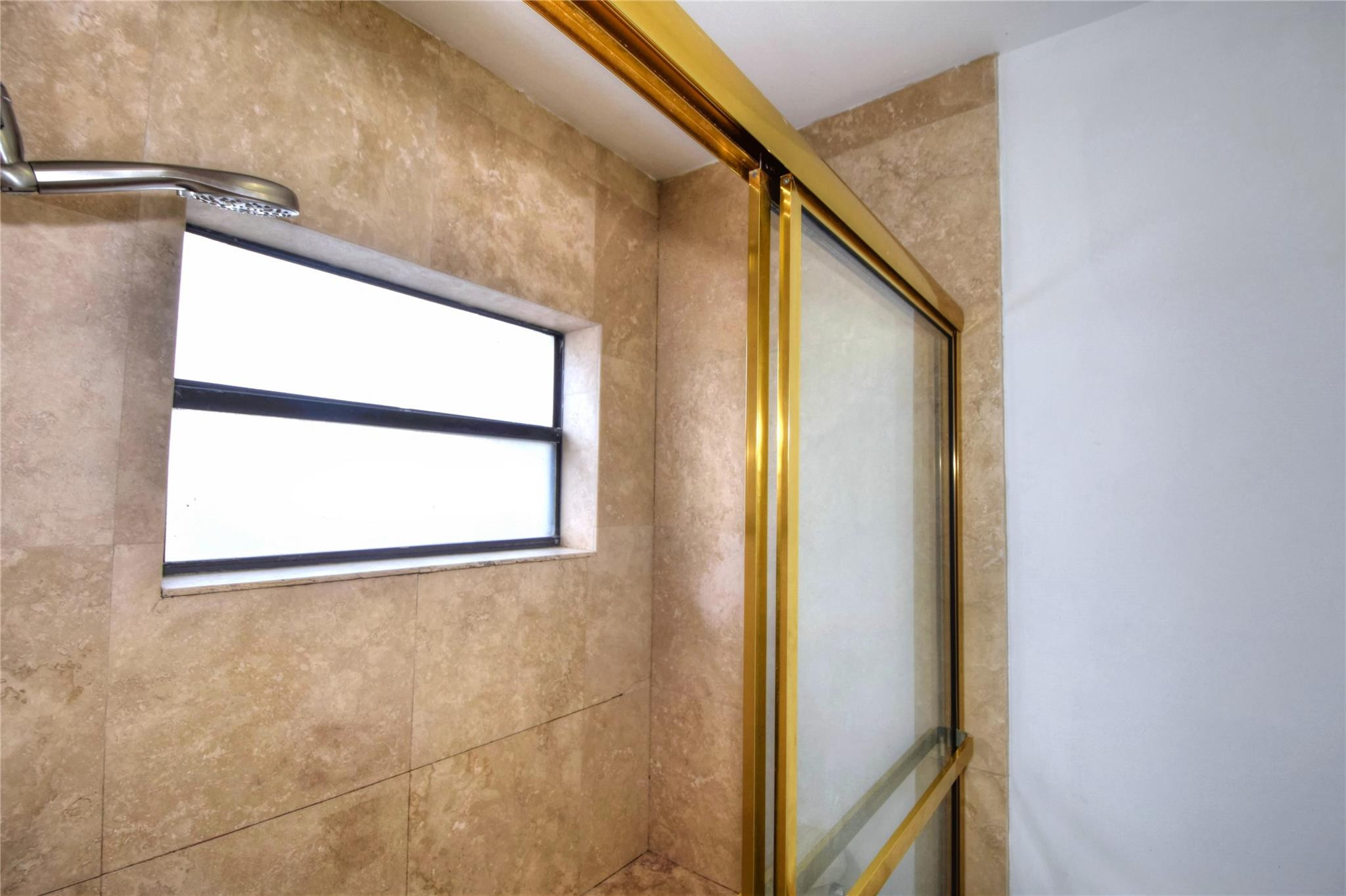 149 Northwest 70th Street, Unit 305C Boca Raton, FL 33487 - Photo 19 of 32 Travertine marble shower