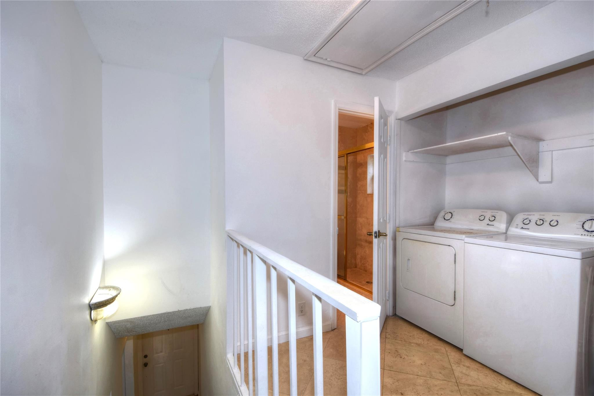 149 Northwest 70th Street, Unit 305C Boca Raton, FL 33487 - Photo 24 of 32 Laundry upstairs