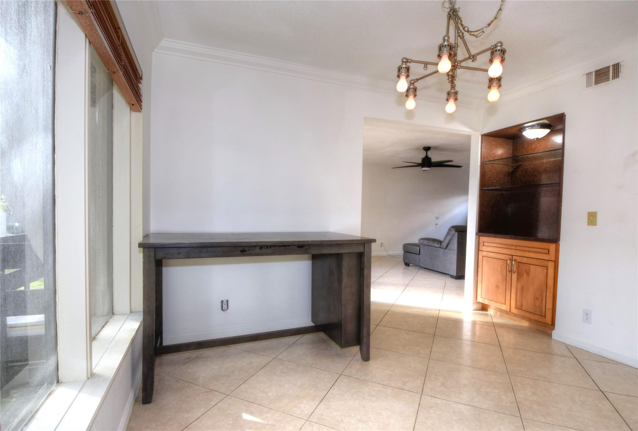 149 Northwest 70th Street, Unit 305C Boca Raton, FL 33487 - Photo 9 of 32 Built-in cabinetry in dining room