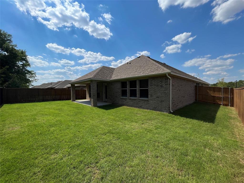 1420 Elizabeth Street Anna, TX 75409 - Photo 17 of 18 a front view of a house with garden