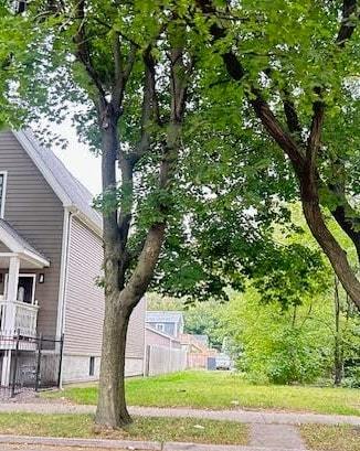 4250 South Wells Street Chicago, IL 60609 - Photo 4 of 5 a front view of a house with garden
