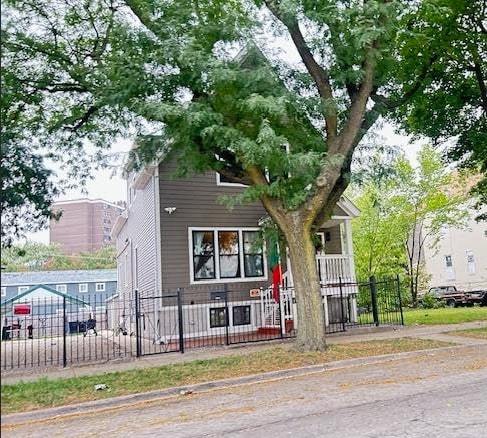 4250 South Wells Street Chicago, IL 60609 - Photo 5 of 5 a front view of a house with a tree