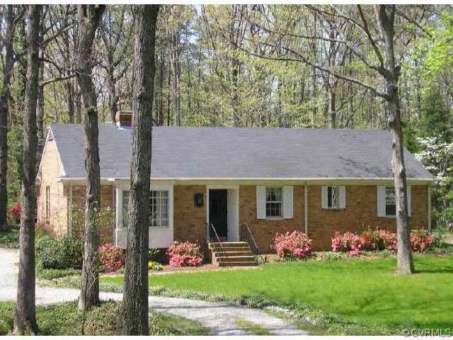 3728 Cheverly Road Richmond, VA 23225 - Photo 1 of 1 a front view of a house with garden