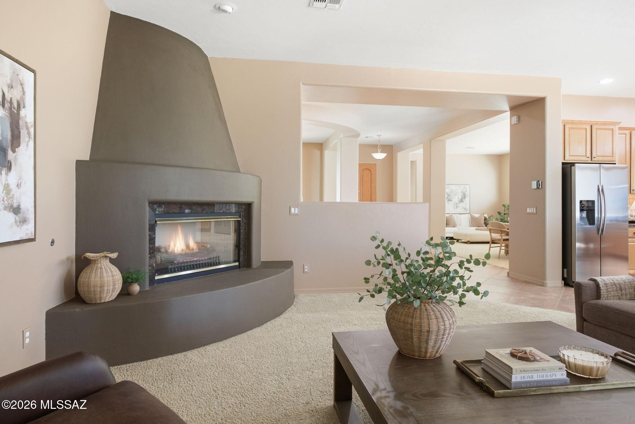 12641 North Rock Creek Road Oro Valley, AZ 85755 - Photo 7 of 48 Imposing gas beehive fireplace.