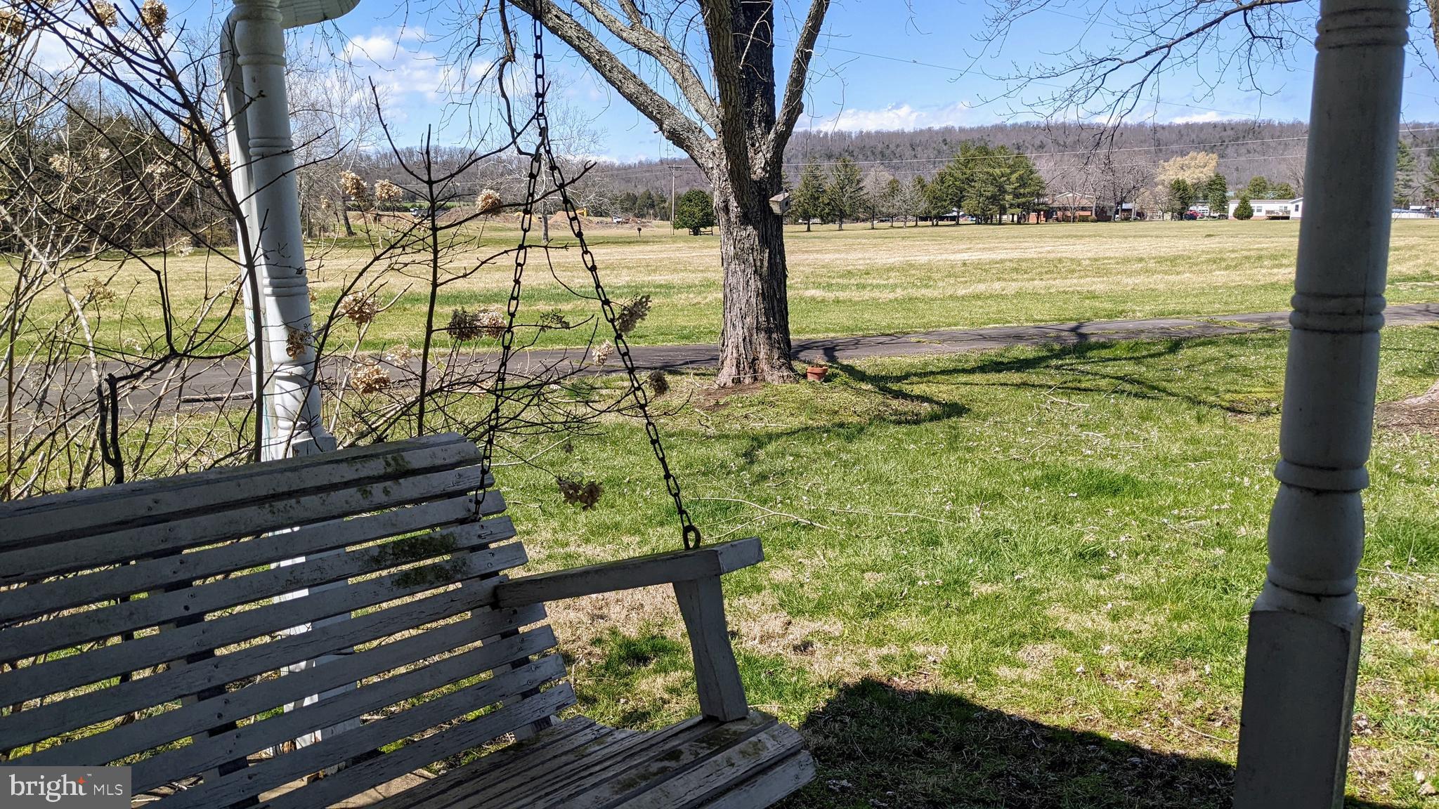 20210 Mt Pony Road Culpeper, VA 22701 - Photo 20 of 35 Front porch swing