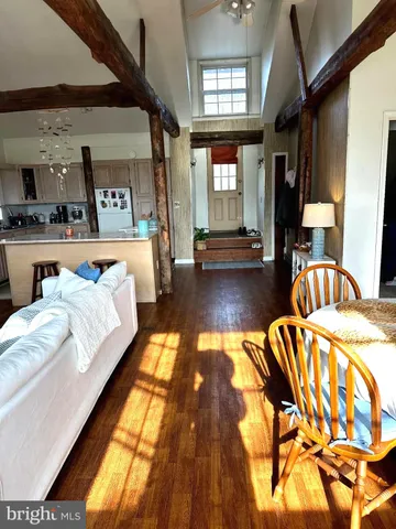 a bedroom with bed and window