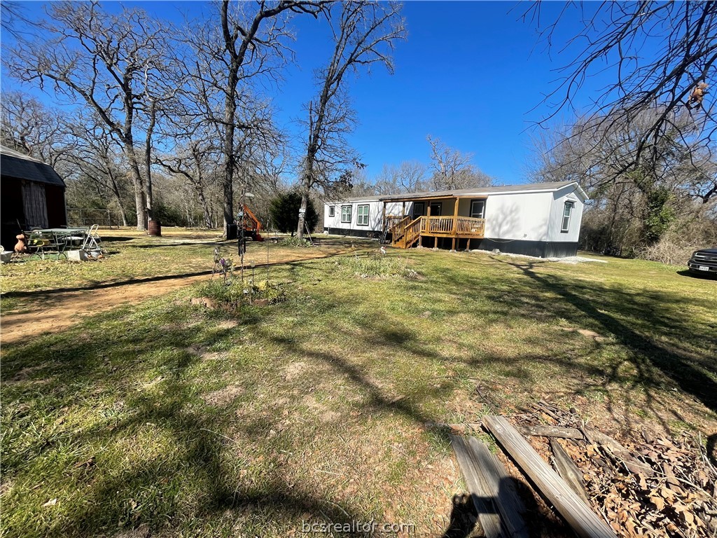 11320 Old Hearne Road Bryan, TX 77807 - Photo 21 of 26 a view of a house with a yard