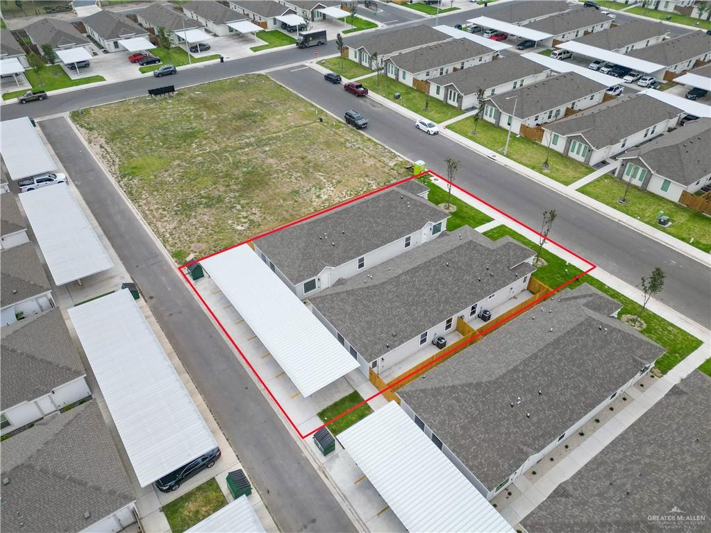 5704 Swallow Avenue, Unit 3 McAllen, TX 78573 - Photo 18 of 21 an aerial view of residential houses with outdoor space