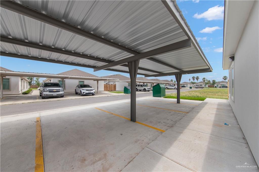 5704 Swallow Avenue, Unit 3 McAllen, TX 78573 - Photo 20 of 21 a view of a car parked in front of a building