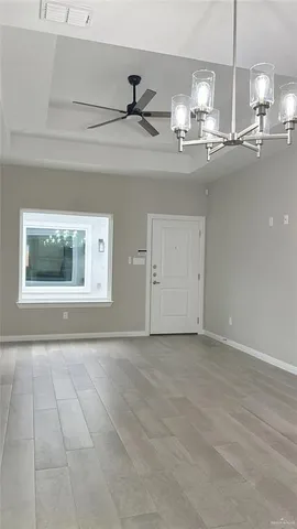 a view of an empty room and window