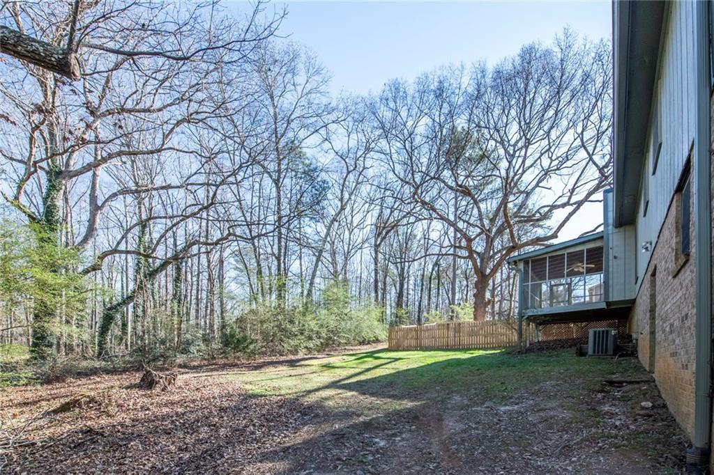 4597 East Glen Ridge Circle Winston, GA 30187 - Photo 8 of 38 a view of a house with a yard