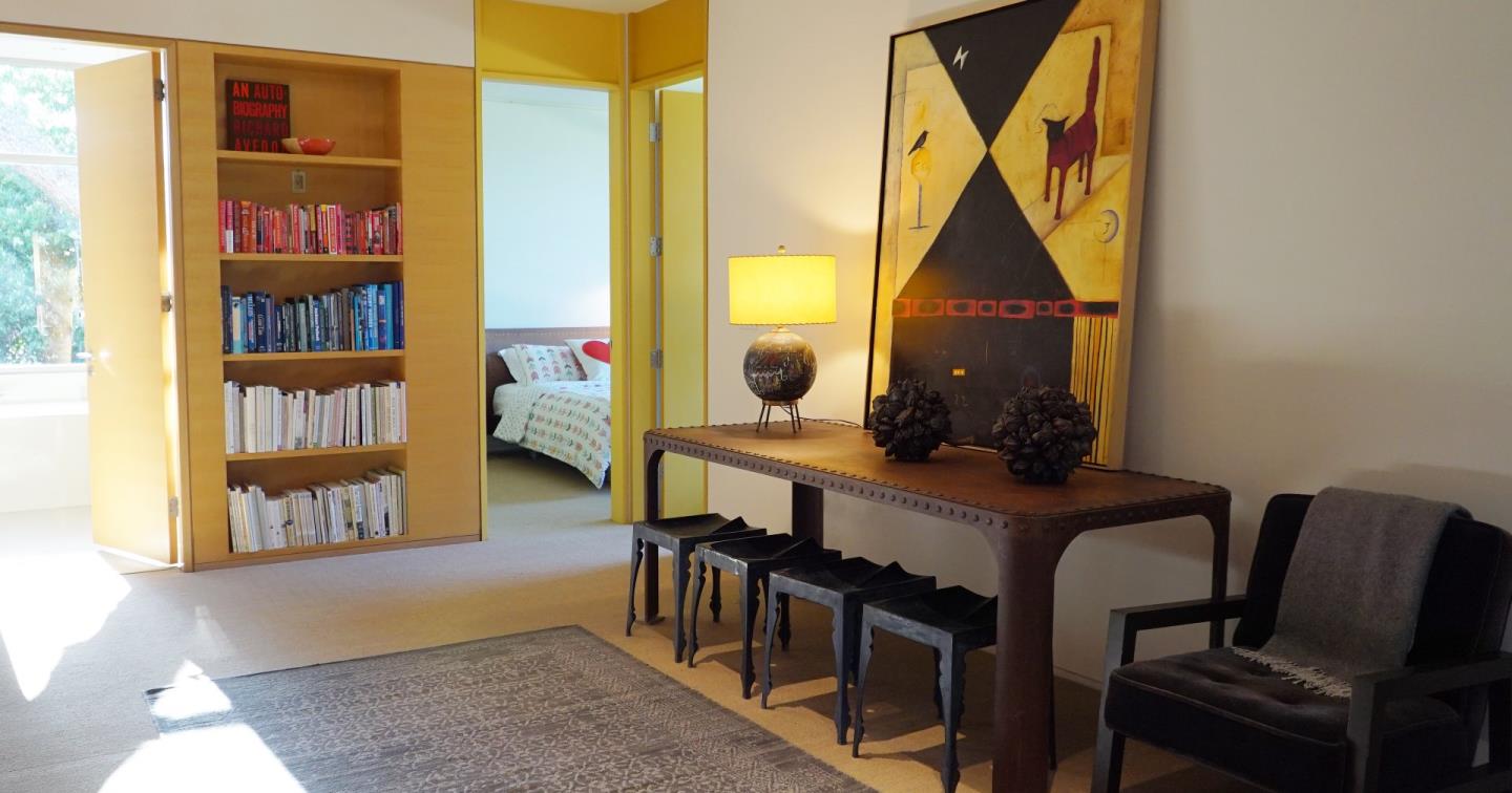 12950 Robleda Road Los Altos Hills, CA 94022 - Photo 20 of 39 a view of a workspace with furniture and toys