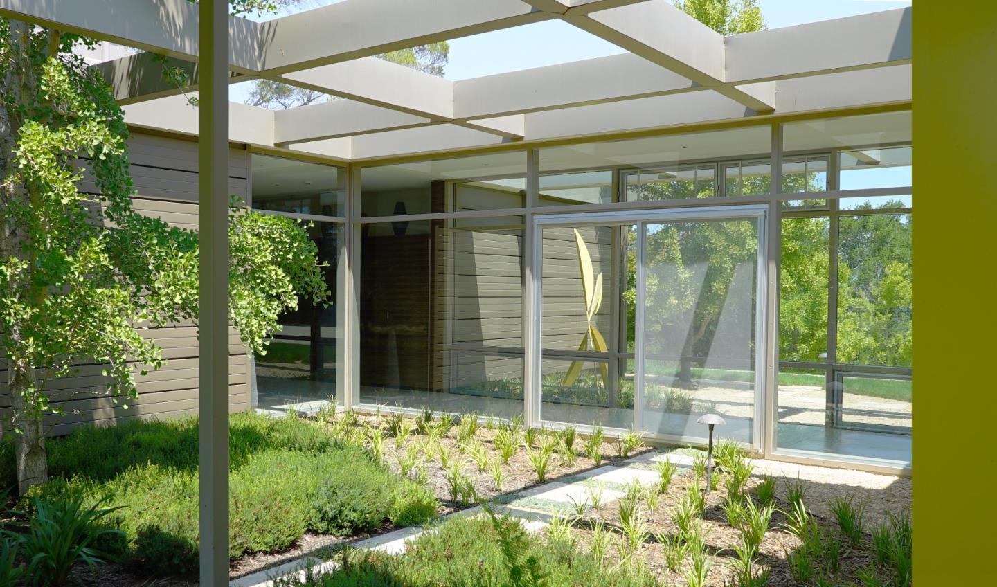 12950 Robleda Road Los Altos Hills, CA 94022 - Photo 7 of 39 a view of a backyard with garden