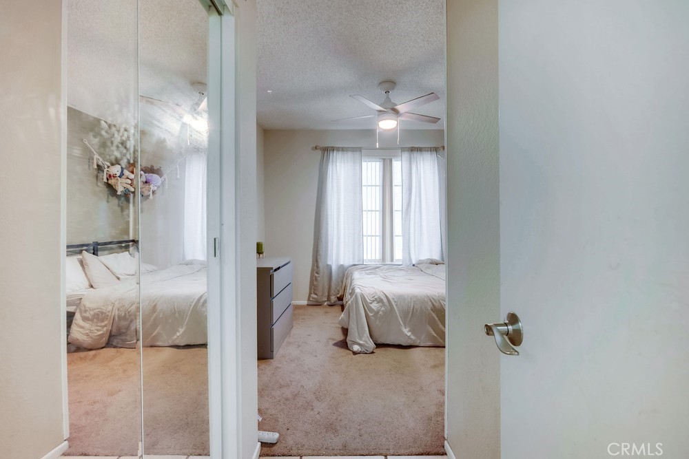 930 Countryside Street Hemet, CA 92545 - Photo 22 of 45 a en suite bathroom with a granite countertop sink and a mirror