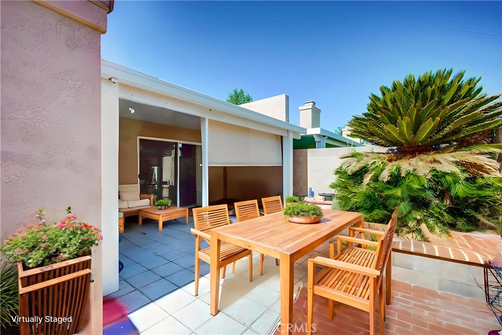 930 Countryside Street Hemet, CA 92545 - Photo 3 of 45 a outdoor dining space with furniture and wooden floor