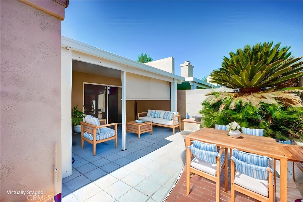 930 Countryside Street Hemet, CA 92545 - Photo 35 of 45 a outdoor space with patio the couches and a potted plant
