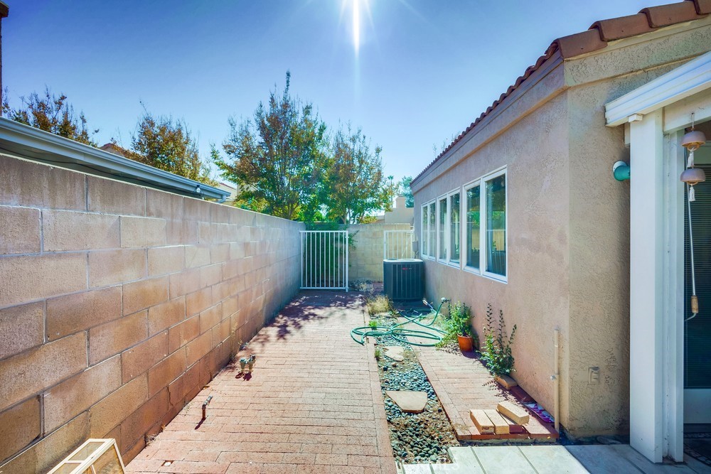930 Countryside Street Hemet, CA 92545 - Photo 41 of 45 a view of a pathway with a house