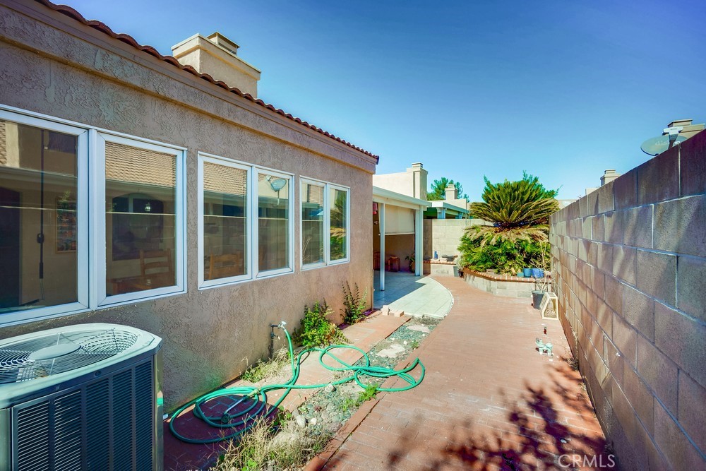 930 Countryside Street Hemet, CA 92545 - Photo 42 of 45 a front view of a house with a yard